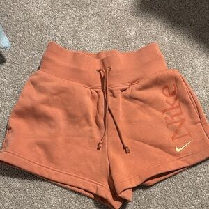 Nike Women's Athletic Shorts in Rust Orange